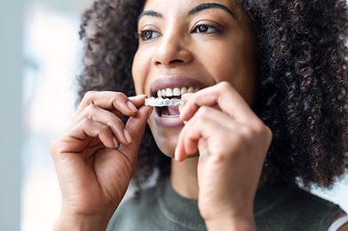 woman wearing invisalign
