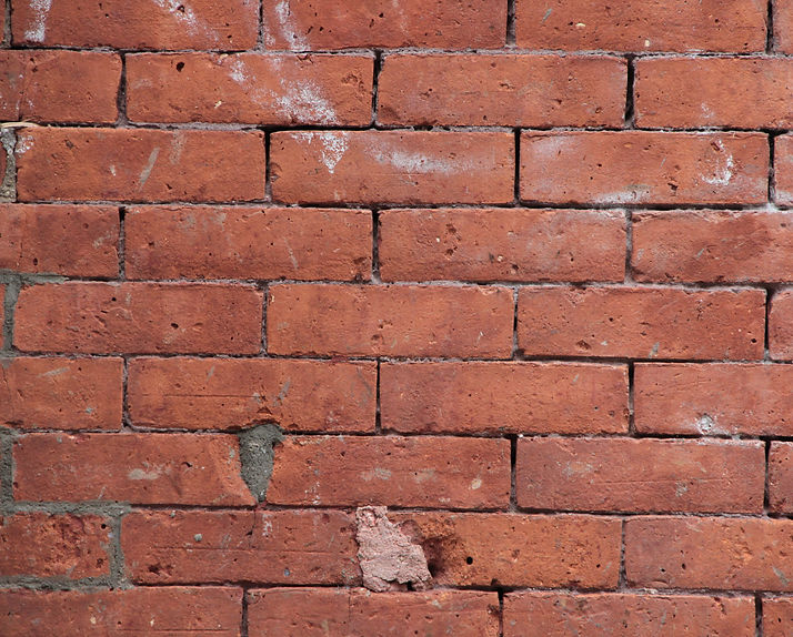 brick wall with exposed mortar