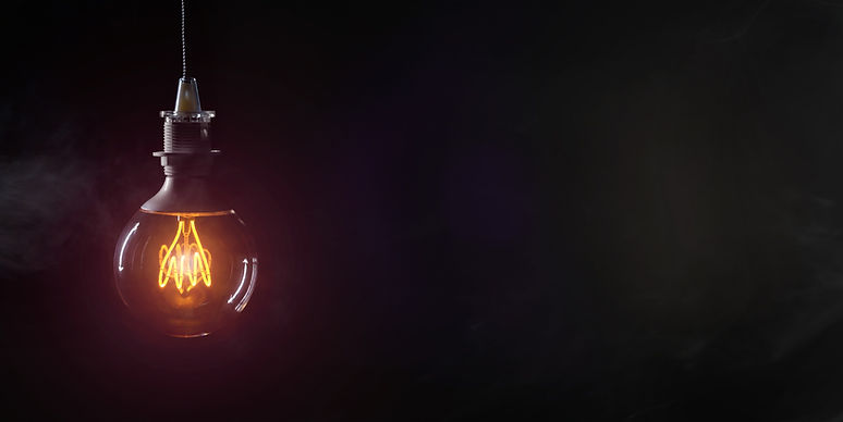 Vintage lightbulb on dark background_edited.jpg