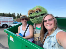 Smoky Lake Waste & Recycle truck and bins