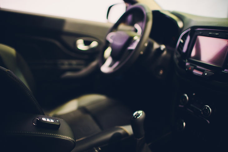 Closeup inside vehicle of wireless key ignition_