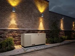 building with a generator at night