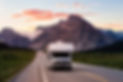 Family RV driving through the Rockies