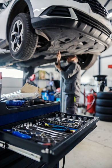 mechanic working on car