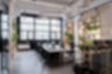 Modern open space office with lights and big windows