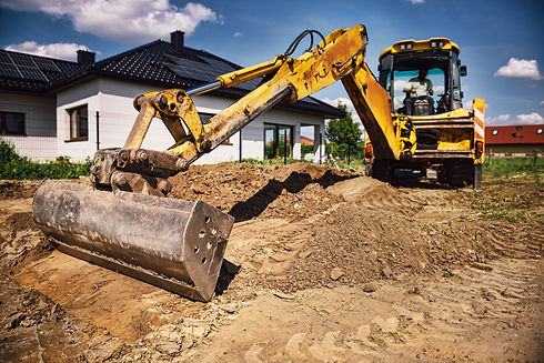 excavator on residential plot