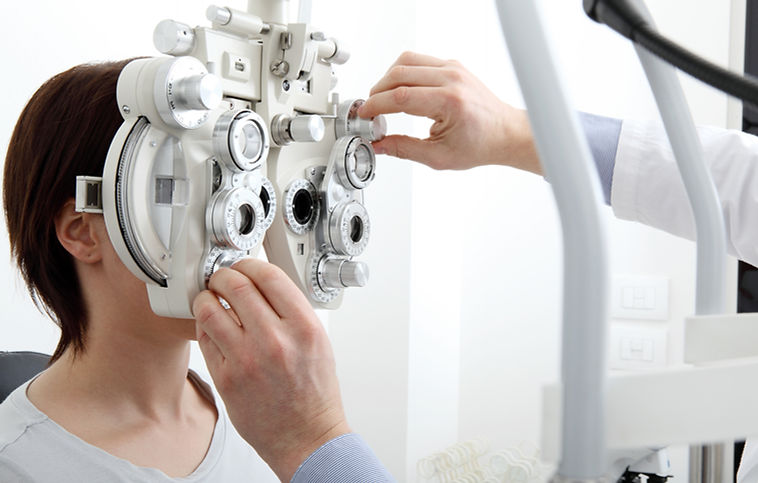 woman doing eye exam