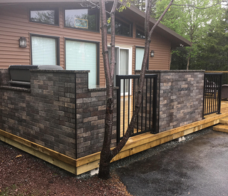 Deck made of wood and stone walls