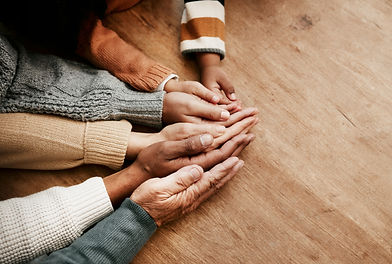 hands of multi-generational family