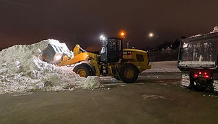 snow removal with yellow charger