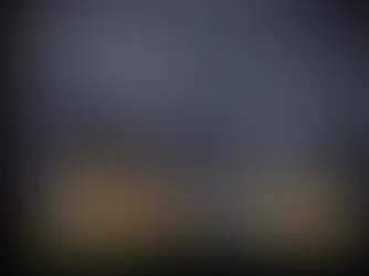 commercial building at night with generator