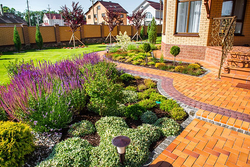 home with garden and interlocking bricks