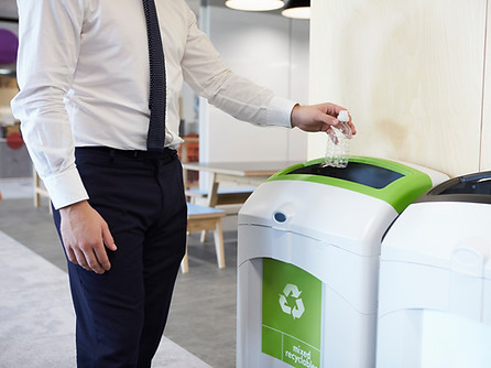 office worker sorting recyclables