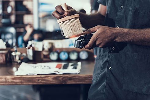 male barber preparing and cleaning tools