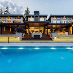 mansion with swimming pool and concrete stairs