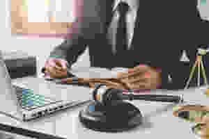 lawyer working at laptop