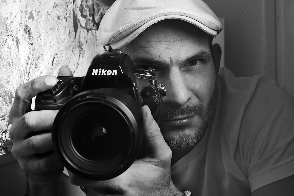 Photographe professionnel avec son appareil photo