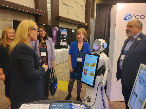At TiLTC - Angelo Colallilo talking to MPP Kusendova-Bashta with Lee, Maria and Debby in the background