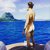 Crazy Miley Cyrus Adds More Butt To Justin Bieber's Naked Butt To Form Rihanna's butt...