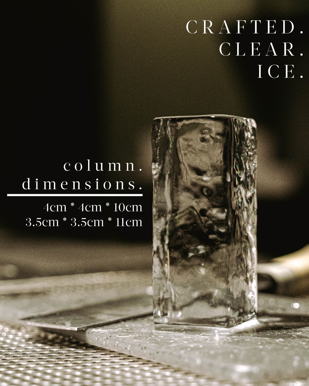 Tall clear ice column in a highball glass for café cold brew
