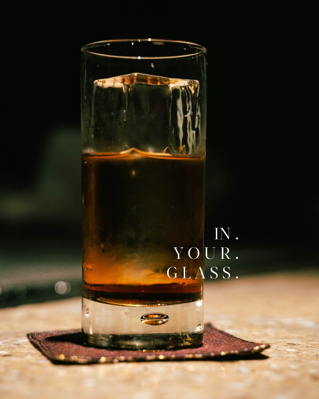 Clear ice sphere in a tumbler for premium whisky service
