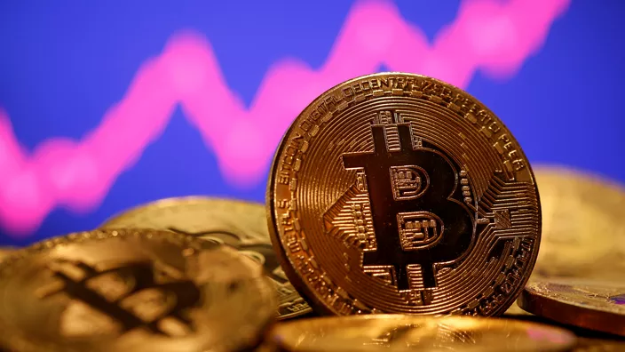 Sujet Veille Technologie : Bitcoin : la cryptomonnaie chute après avoir enchaîné les records