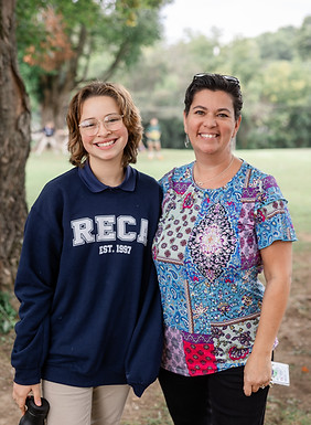 A Private High School student poses with her parent