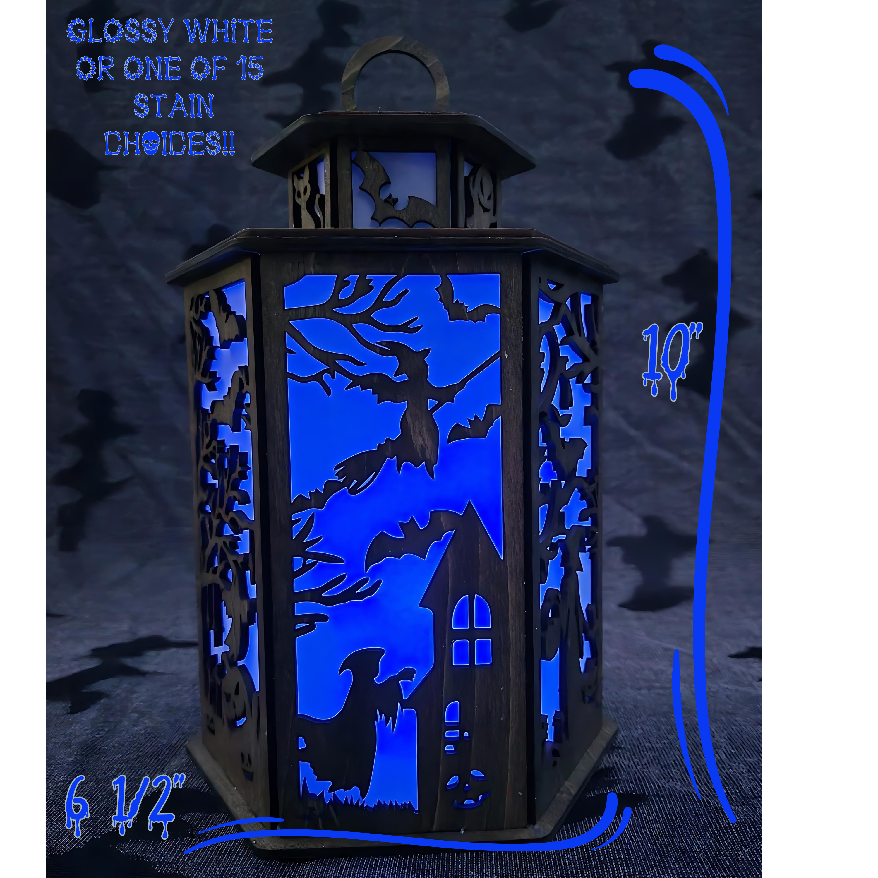 Halloween Tealight Spooky Visitors showing the dimensions and lite in a blue candle light.