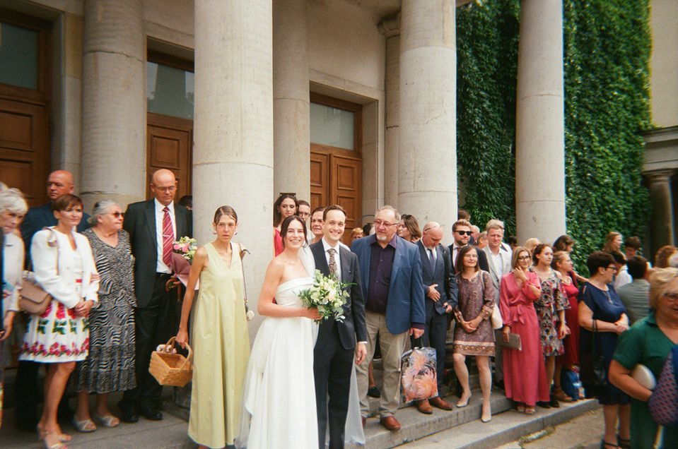 Wedding guest front of the church in Poznan