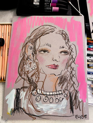 Elyse Blackshaw creating a live fashion portrait illustration at an event, demonstrating her live portrait and event illustration skills.
