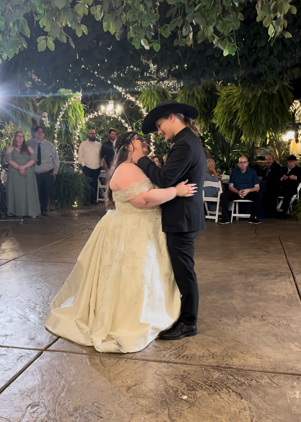 Such a tender moment when the groom touched his new bride's face