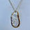 Thumbnail: Large White Shell with Gold Accents Pendant