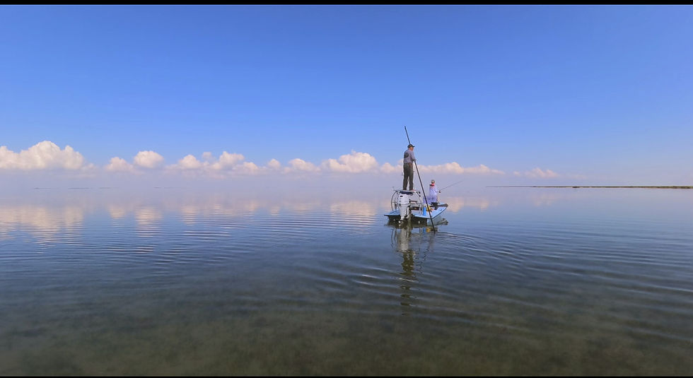 poling a skiff in the bay