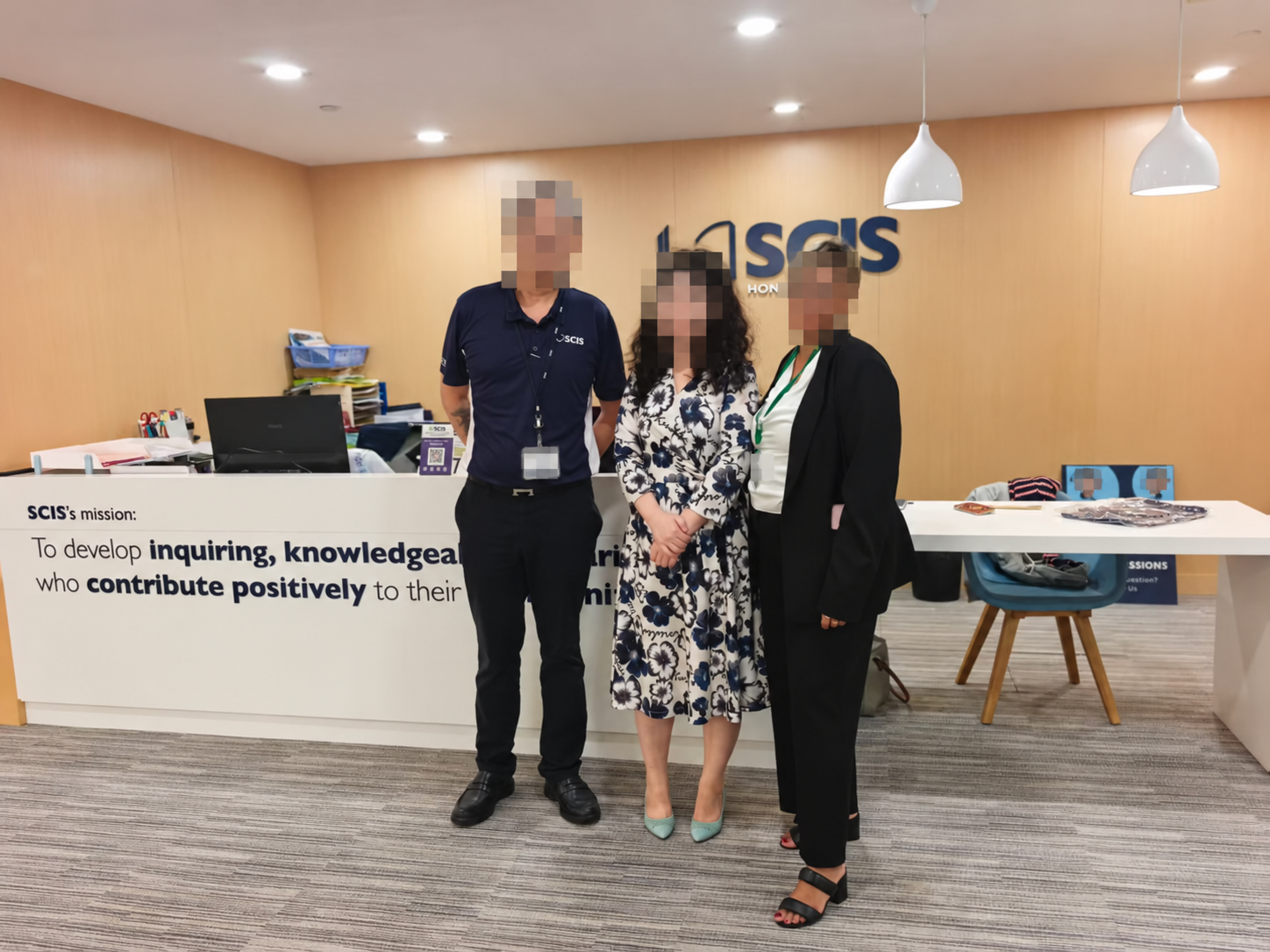 Willowbank principal’s visit to China; faces obscured for privacy