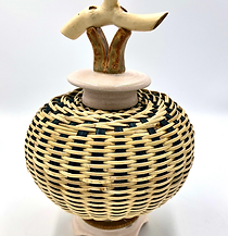 Stephen Kostyshyn is a well known basket maker based in Traverse City, Michigan. His reed and palm baskets are unique as they combine his wheel thrown pottery as well. Stephen Kostyshyn's vessels and artworks can be found at Higher Art Gallery