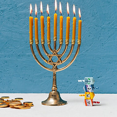 hebrew-candlestick-holder-burning.jpg