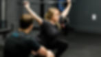 Physical Therapist instructing overhead squat technique in Nashville and Franklin, TN.