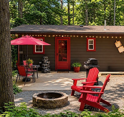 Exterior of Toasted Marshmallow cabin with private firepit, deck, and outdoor seating at Babbling Brook Cottages near the Del