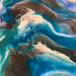 Abstract blue waves churning in ocean