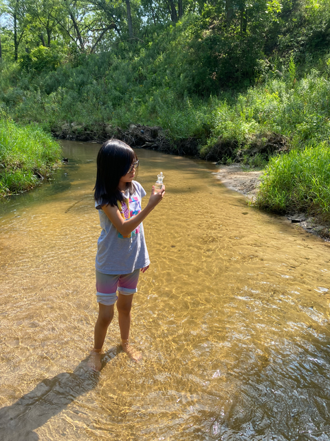 Person holding sample
