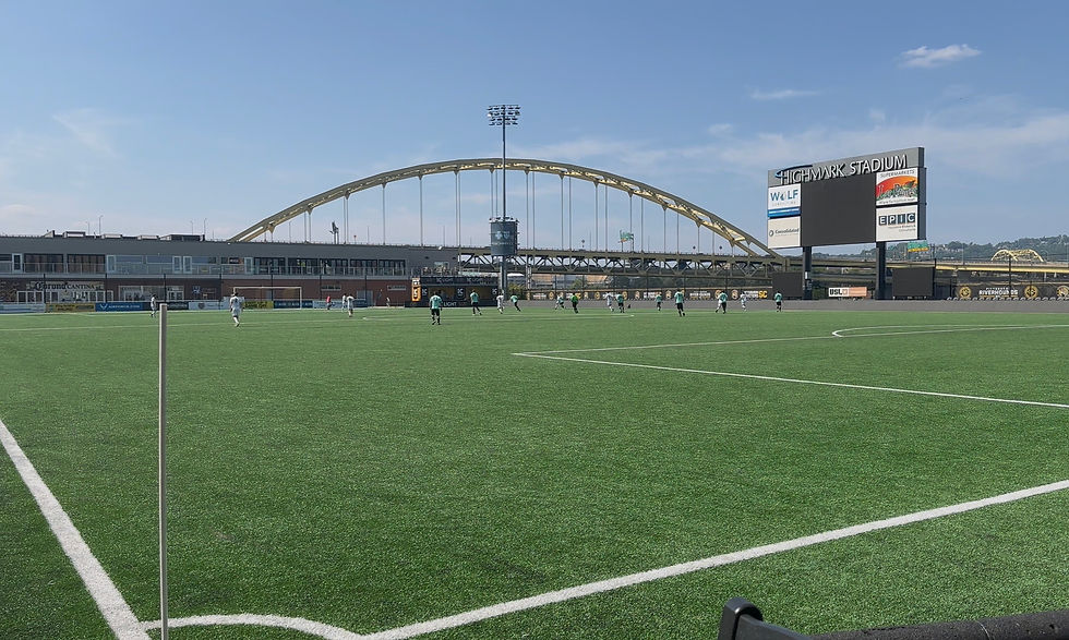 Highmark Stadium with a bridge in the background during a sunny day of soccer.