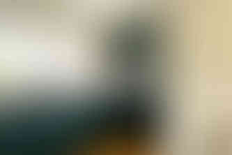 Cuisine design Nice : aménagement ergonomique avec colonne de rangement, électroménagers intégrés et finitions élégantes.