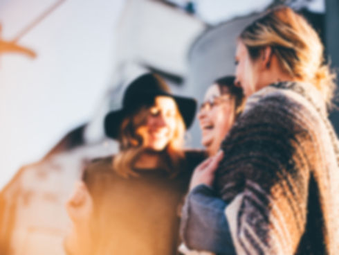 Image of people laughing in a group