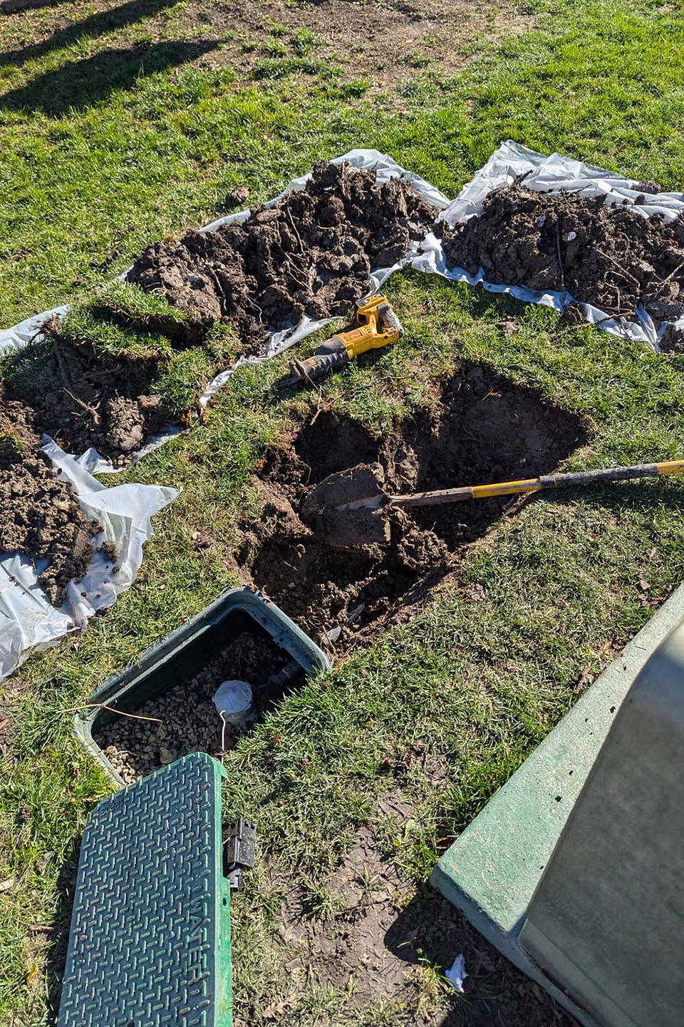 Dug up lawn to exposed sprinkler line