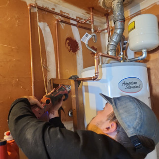 Running pipe into the wall