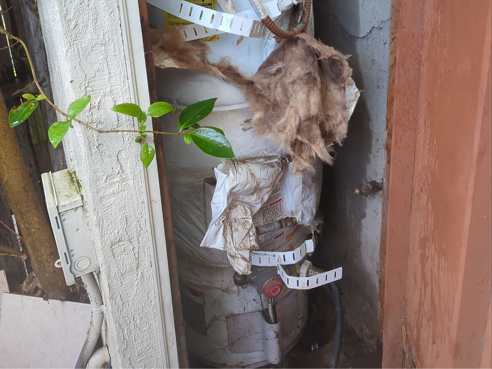 Old water heater in a tight space