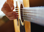 Playing Acoustic Guitar