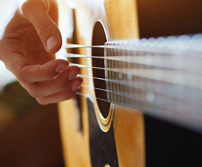 Playing Acoustic Guitar
