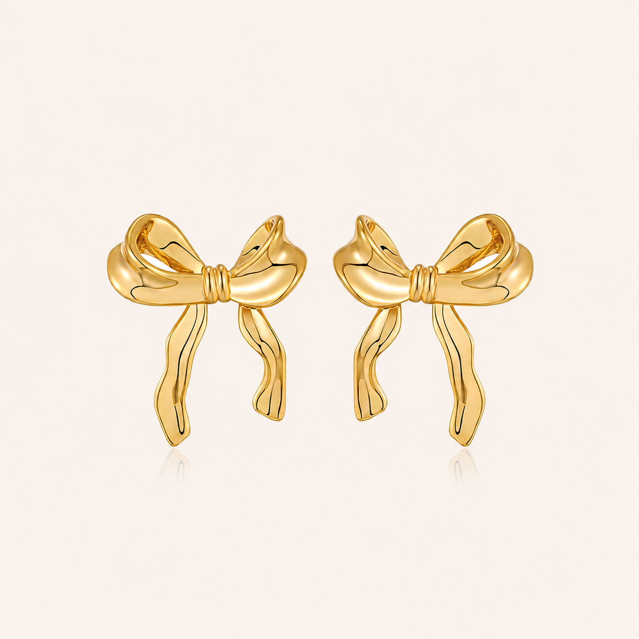 Dangled Bow Studs in Sterling Silver