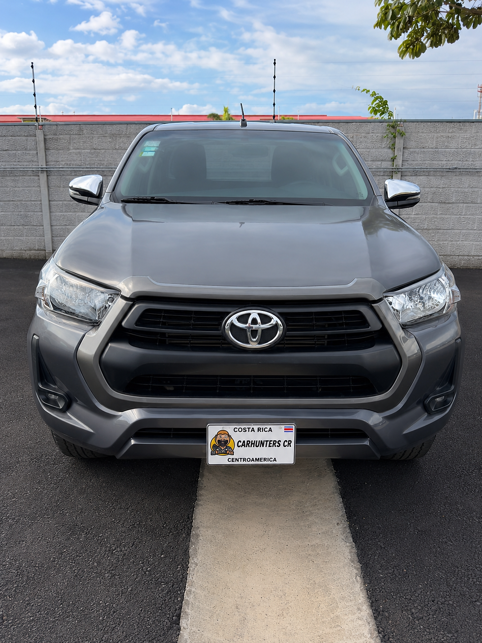 2023 Toyota Hilux Extra Cab 4x4 gray pickup front view - used truck for sale in Costa Rica
